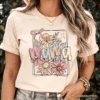 Floral Mama Coquette Bow Pastel T-Shirt, White And Natural Boho Tee With Spring Flower -Eds Plant Shop floral mama coquette bow pastel t shirt white and natural boho tee with spring flower 812049
